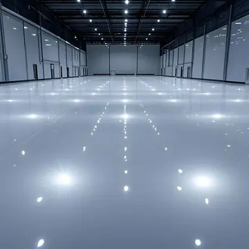 Pale resin floor across a large commercial hall